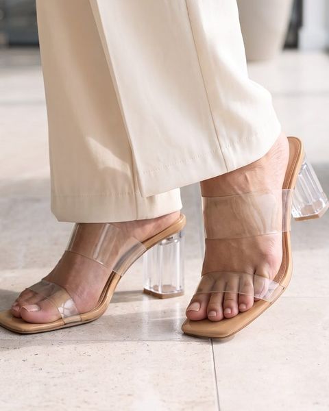 Clear-strap block heels, as styled on Meera