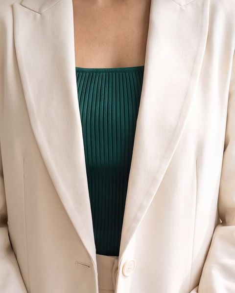 Deep emerald square-neck top, as styled on Meera